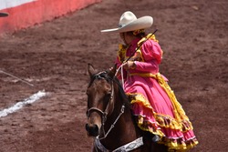 Skirmishers Mexican horse riders in
rodeo