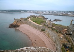 Elizabeth castle with view over bay to St.Helier, Jersey, Channel Islands