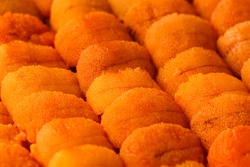 Close up raw fresh sea urchin or Uni, Sushi and Sashimi ingredients. popular Japanese tradition food.