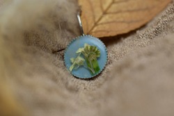 Macro photography of jewelry and bijoux in natural fabrics. Retro style, rustic style, and country style