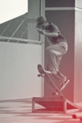 Blurred image of teen practice skateboard. sport wallpaper design for presentation, website etc. 
