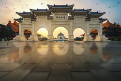 Early morning at the Archway of CKS (Chiang Kai Shek) Memorial Hall, Tapiei, Taiwan. The meaning of the Chinese text  on the archway is 