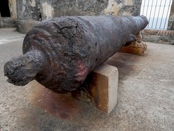 Close up of a rusty base of an old cannon at El Morro Fort, Old San Juan, Puerto Rico