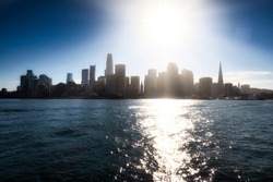 Sausalito, United States - February 13 2020 : a silhouette panoramic view of the skyline of san francisco from the water