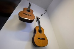 SPANISH GUITARS HANGING ON THE WALL