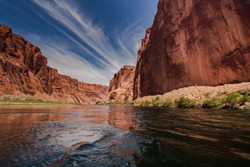 colorado river with gorgeous sandstone walls and canyons 
