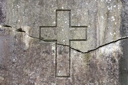 Horizontal crack on the wall depicting a cross. The split between the churches concept.