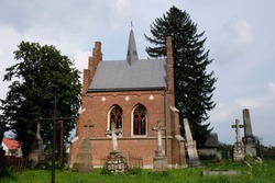 Ukraine, Komarno - neo-gothic brick chapel from the end of the 19th century at the Polish cemetery