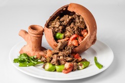 Authentic Turkish Testi Kebab cooked in earthenware waterjug