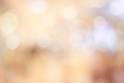 abstract blurred golden color background in light warm tone.