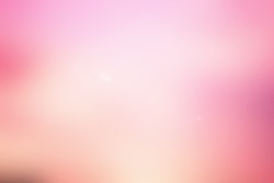 blurred colorful soft glowing background with shiny lens flare.