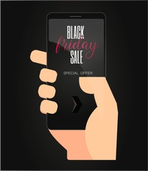 a human hand is holding a smart phone and inside it is black friday message