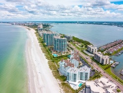 Sand Key Beach and Clearwater Beach FL. Spring break or Summer vacations in Florida. Ocean beach and Resorts in US. American Coast or shore. Island in Gulf of Mexico. Aerial view of city.