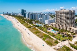 Miami Beach Florida. Panorama of Miami South Beach City FL. Atlantic Ocean. Summer vacations. Beautiful View on Residential house, Hotels and Resorts on Island. Turquoise color of salt water. Aerial