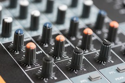 Audio mixer, music equipment in selective focus.