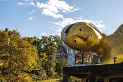 Close up the head of big sleeping buddha statue at Wat  Pasawangbun temple, Chonburi province, Thailand