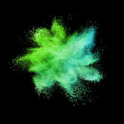 Decorative chaotic multicolored powder burst or explosion on a black background with copy space.
