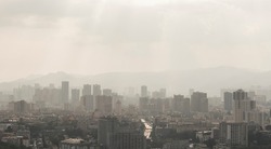 Aerial view of polluted air covering the sky in industrial city backgrounds