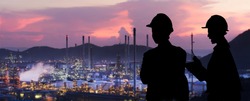 Silhouette engineers are standing orders The oil refining industry