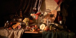 Still life in old masters style with lobster, glass of wine, silver dishes, fruits, guitar lute and hunting horn.            