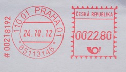 red ink postage meter from Prague over white envelope