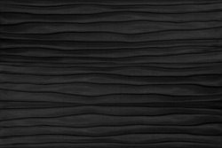 Contemporary carved wavy black leather pattern