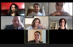 Shot of a screen of teammates doing a virtual conference from their home offices.  Team meeting from home during COVID-19 coronavirus pandemic.
