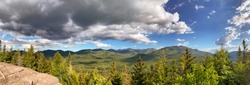 Panorama of landscape of Adirondacks mountains in upstate New York near Lake Placid.  Beautiful sunny summer day over the forest.