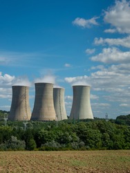 Cooling towers of nuclear power plant  with cloudy sky in the background. Nuclear power station.