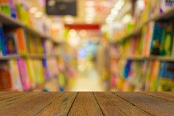 Blur image of book store on shelf at shopping center for background usage.