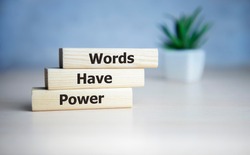 Words Have Power word cube on blue background ,English language learning concept