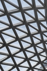 Triangle pattern of building glass roof structure. Architectural glass roof structure with a geometric triangle pattern.