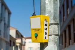 An electronic device with antenna used to call a yellow taxi in Turkey.