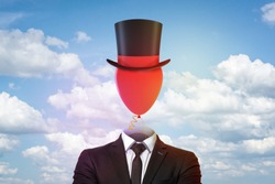 Businessman with top hat and red balloon instead of head on blue sky and white clouds background. Management and society. Digital art. People and objects.