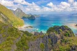 Bacuit Bay view from Taraw Cliff, El Nido Palawan. Rocky mountain trropical landscape over azure sea. Aerial drone view.
