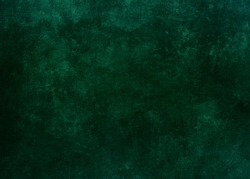 Dark green grungy background or texture 