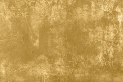 Golden painted stained canvas abstract background 