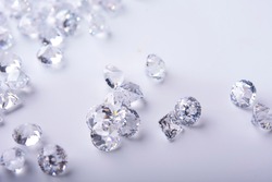 Diamond with tweezers and magnifier.Gemstone Beauty