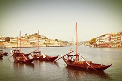 Typical portuguese boats used in the past to transport the famous port wine (Portugal - Europe) - Instagram toned image