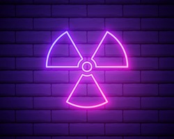 Glowing neon Radioactive icon isolated on brick wall background. Radioactive toxic symbol. Radiation Hazard sign. Vector Illustration.
