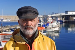 portrait of a fisherman in the harbor
