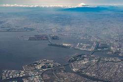 Aerial view of Tokyo Bay and Mount Fuji in Tokyo, Japan.