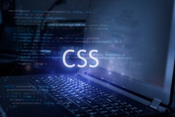 CSS inscription against laptop and code background. Technology concept. Learn programming language.