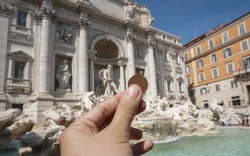 They said tossing a coin from the right hand over the left shoulder will ensure that you will return to Rome in the future