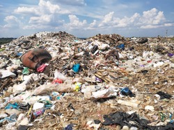 land with  garbage, Garbage dump landscape of ecological damage  contaminated land., plastic scrap in landfill, environmental problems pollution, waste or trash from household in waste landfill