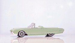 High key photograph of a 1961 Ford Thunderbird Cabriolet toy model car