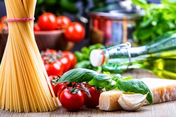Spaghetti tomatoes basil garlic olive oil and parmesan cheese.