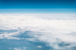 beautiful blue sky with white clouds heaven horizon over the planet earth world, view from the airplane or satellite. atmosphere or stratosphere space layer. astronomy and geology sciense nature