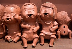 Smiling Children Clay Dolls 
(Taking from Public Area, No Property Release Required)
