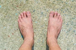 barefoot on concrete floor